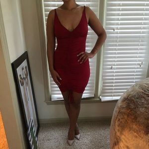 Red spaghetti strap ruched bodycon dress